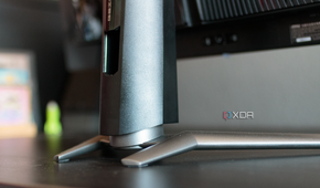 A close-up of the rear of the feet and stand of the MSI MAG 341CQP.