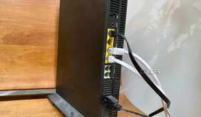 Old fiber router with phone, ethernet, and an ONT