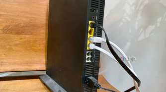 Old fiber router with phone, ethernet, and an ONT