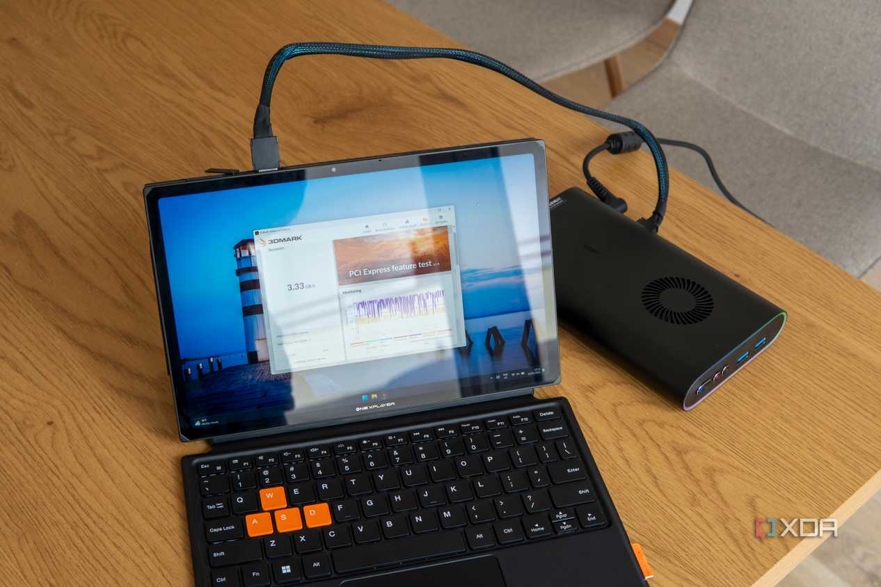 A One Xplayer X1 tablet with a OneXGPU connected via OCuLink showing benchmark results