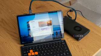 A One Xplayer X1 tablet with a OneXGPU connected via OCuLink showing benchmark results