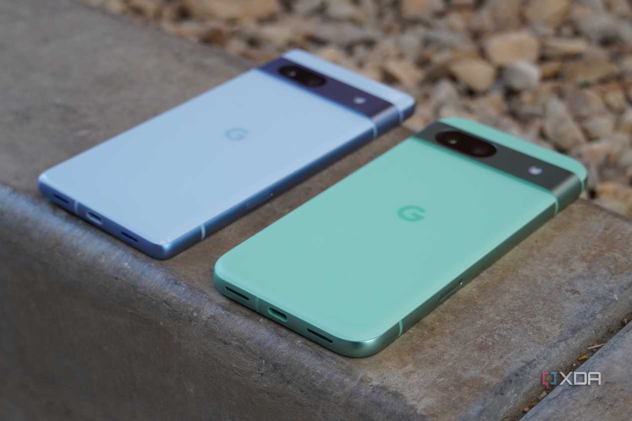 An angled view of the Pixel 7a and Pixel 8a.