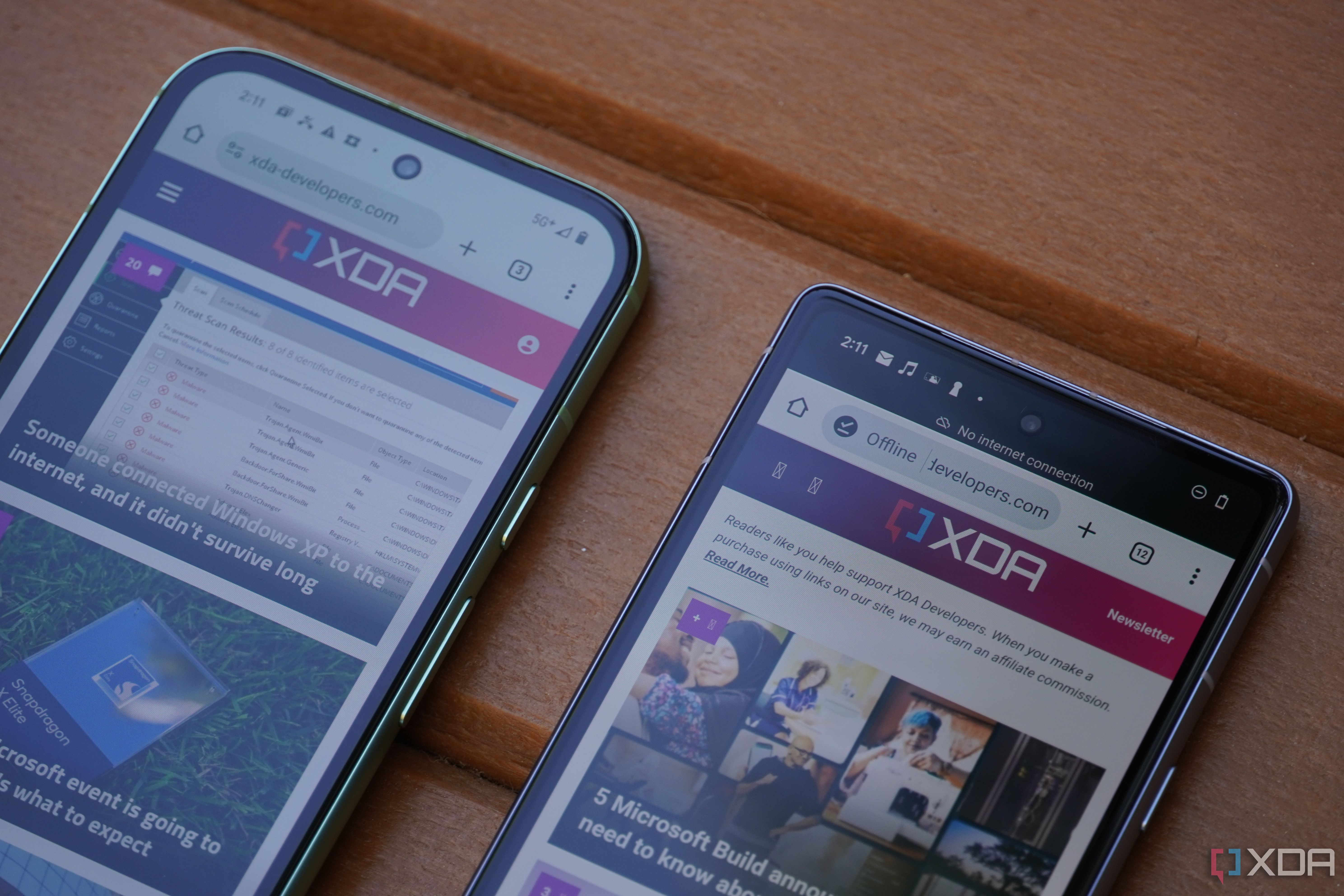 The Pixel 8a and Pixel 7a displays on showing the XDA homepage.