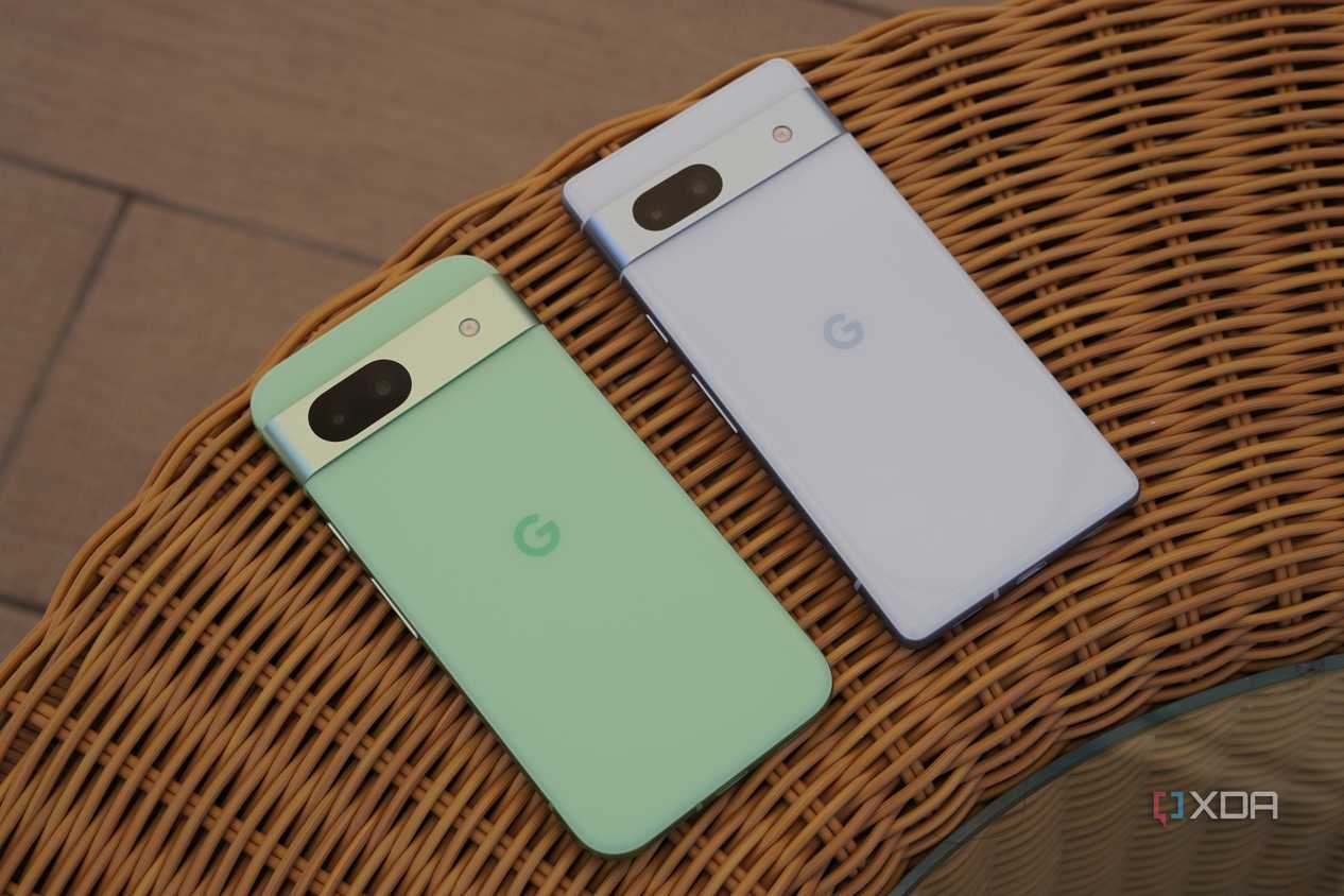 The Pixel 8a and Pixel 7a lying on a table.