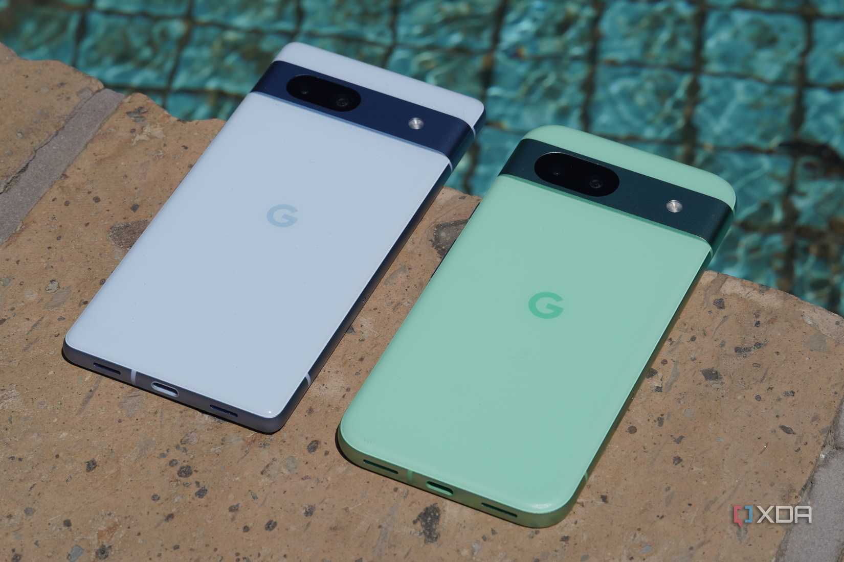 A Pixel 7a beside a Pixel 8a.