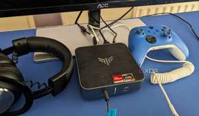 Gaming on a mini PC with xbox controller and logitech headset