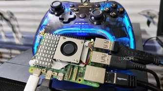 The Raspberry Pi 5 with a controller in the background