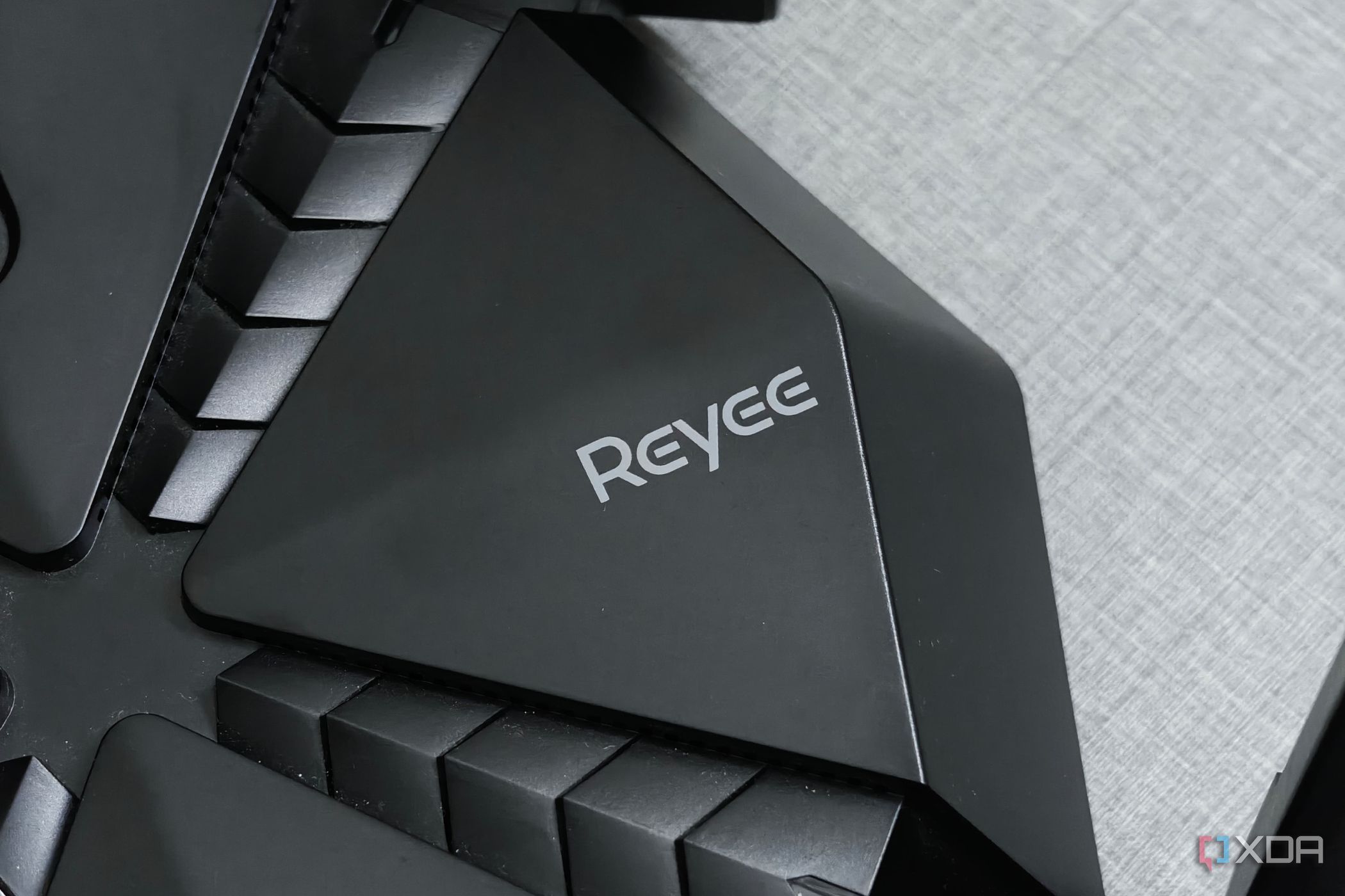 An image showing the Reyee branding on E6 AX6000 gaming router.