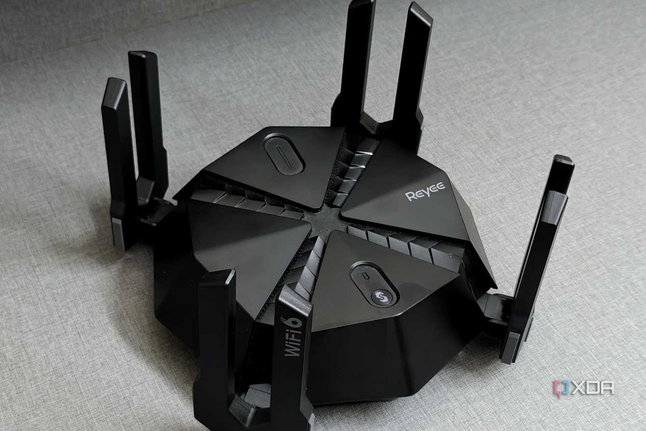 An image showing the Reyee E6 AX6000 gaming router that's kept on a wooden desk.