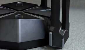 An image showing the side profile of the Reyee E6 gaming router kept on the desk.