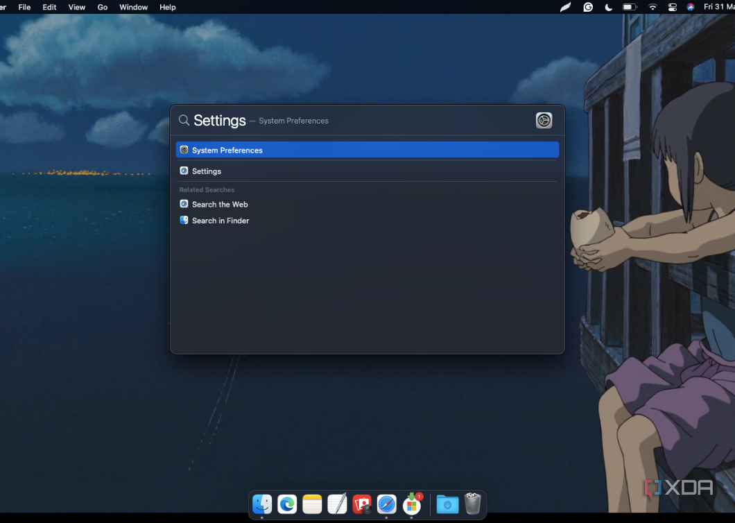 macOS Spotlight Search for Settings.