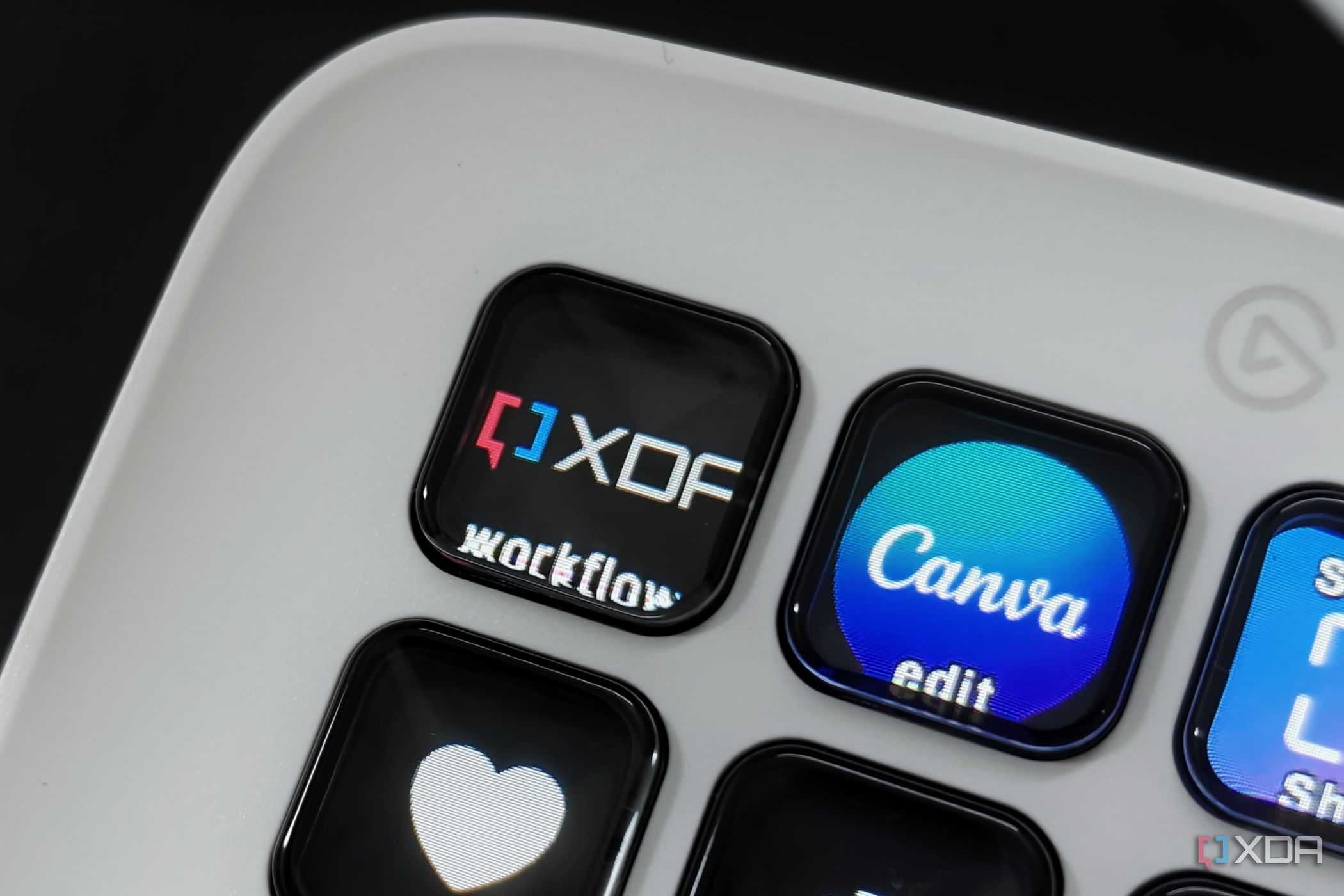 An image showing the Stream Deck Neo displaying a button with XDA logo.