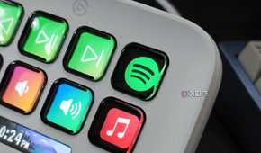 An image showing a Stream Deck Neo displaying a Spotify button.