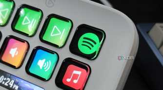 An image showing a Stream Deck Neo displaying a Spotify button.