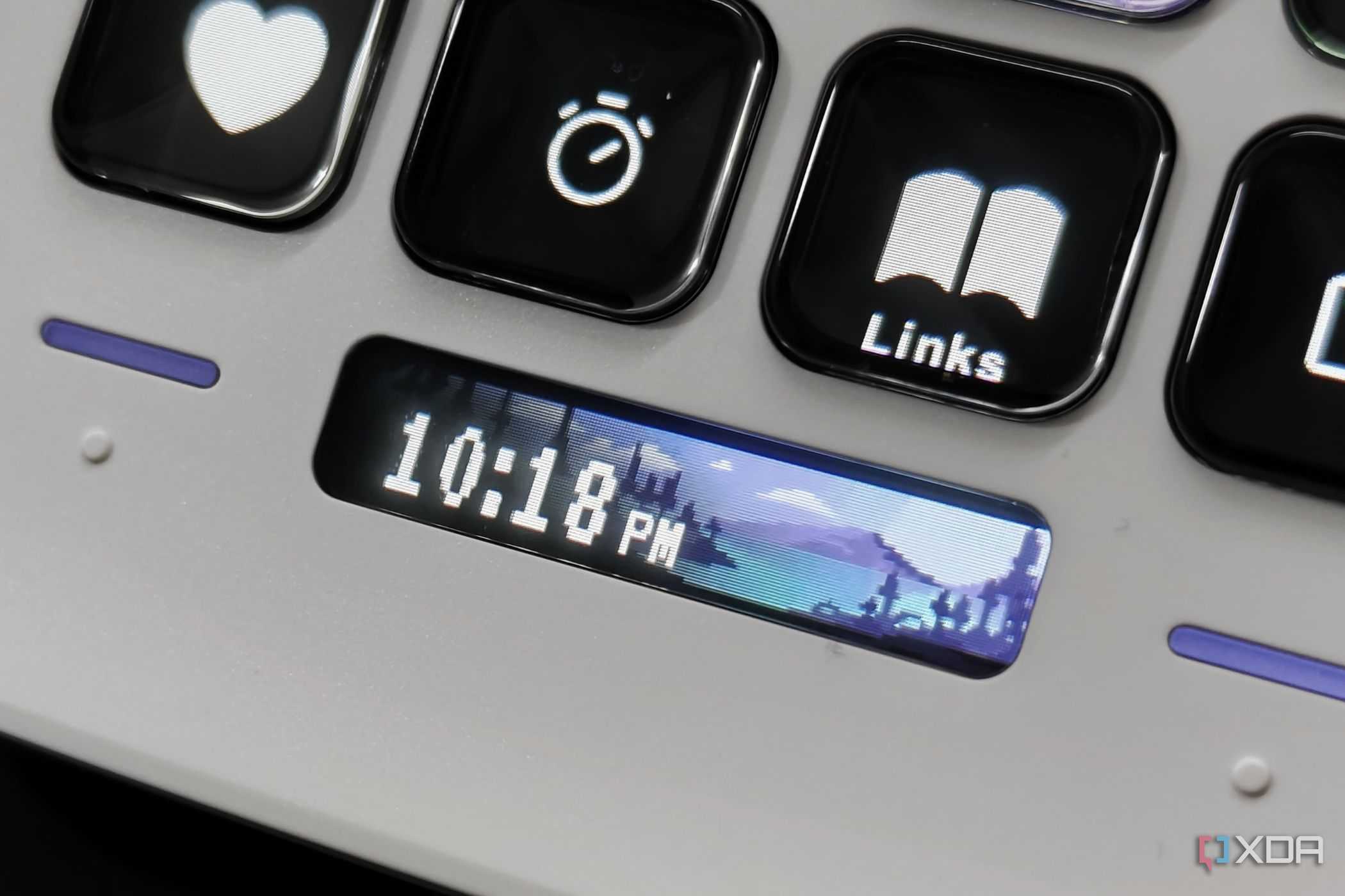 An image showing the Stream Deck Neo displaying a digital clock.