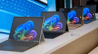 Surface Pro 11 devices on display at a Microsoft event.