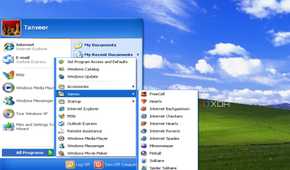 Screenshot of Windows XP desktop showing Start menu and pre-installed games