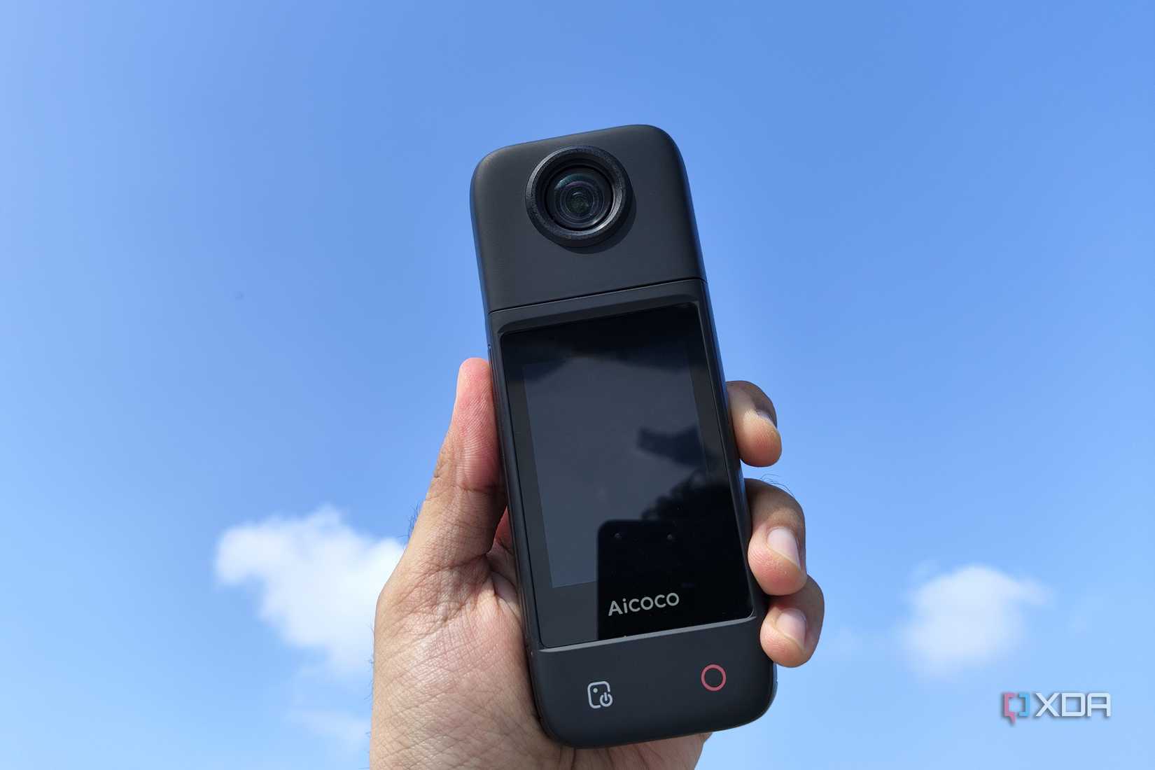 A person holding an Aicoco onAir camera