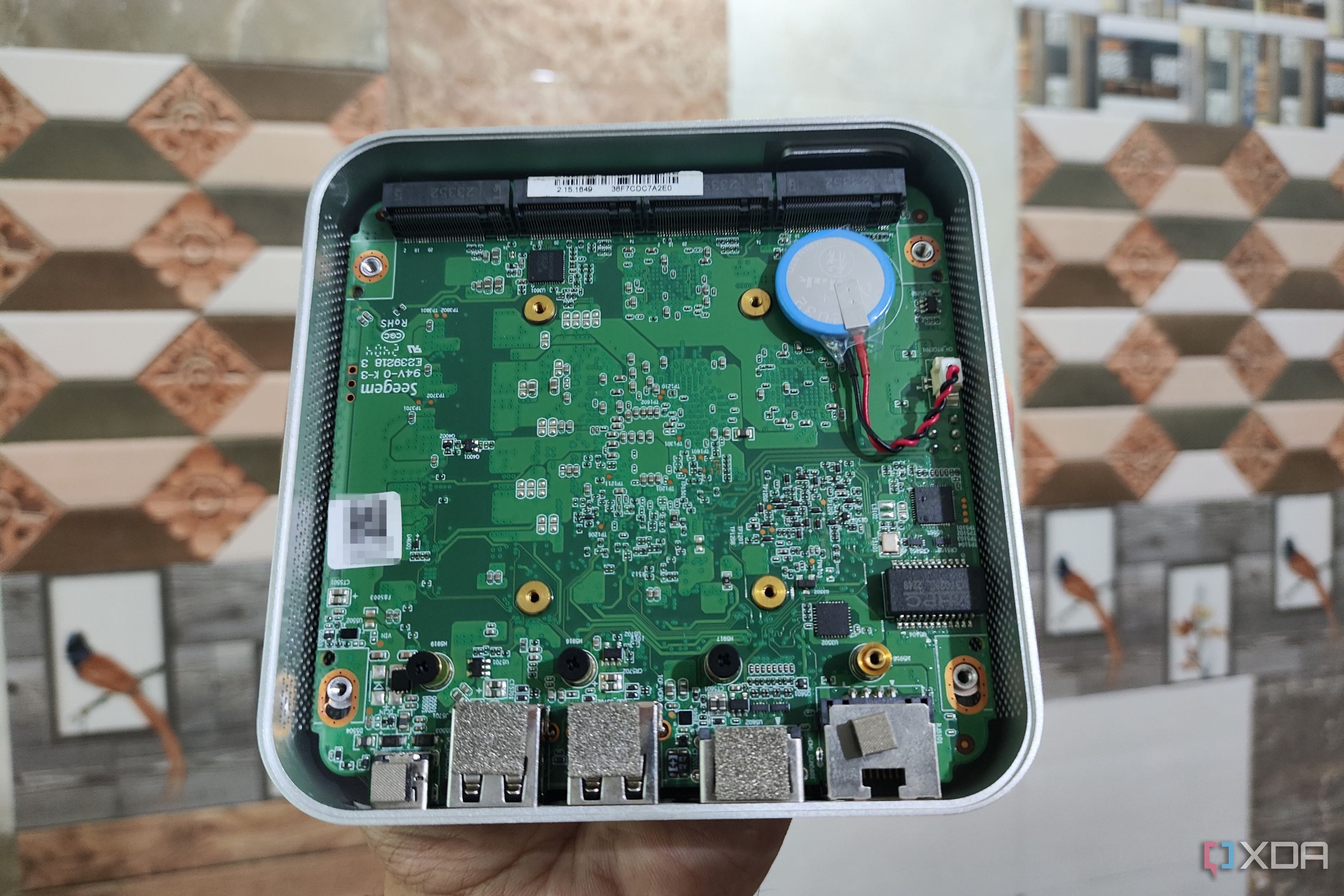 The internals of an Aiffro K100 NAS without the SSDs