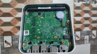 The internals of an Aiffro K100 NAS without the SSDs