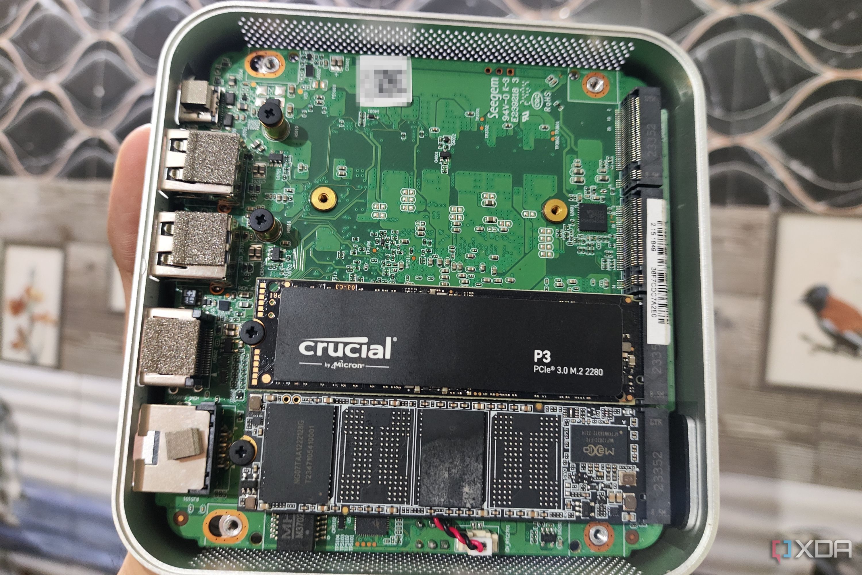 Two SSDs attached to an Aiffro K100 NAS