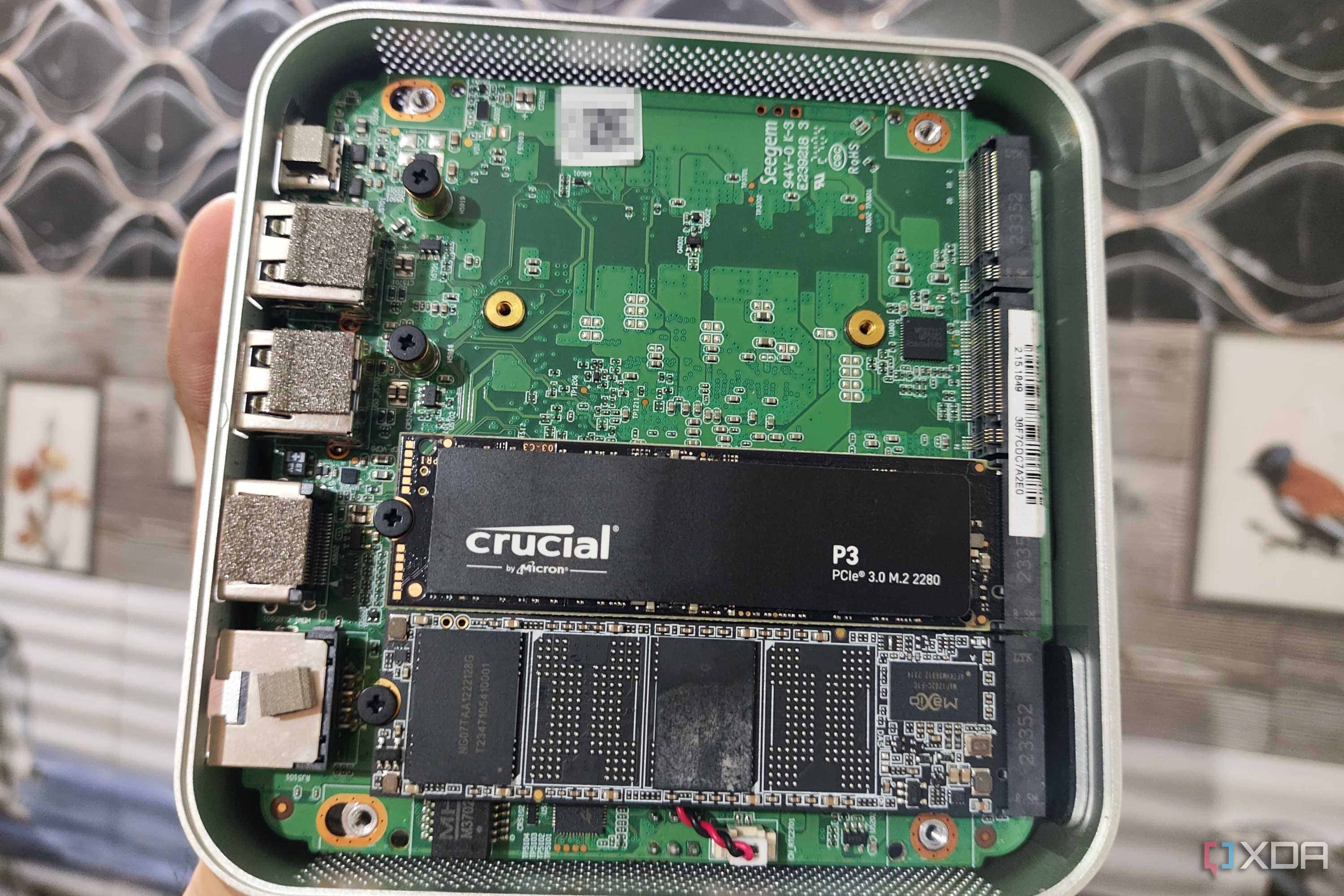 Two SSDs attached to an Aiffro K100 NAS