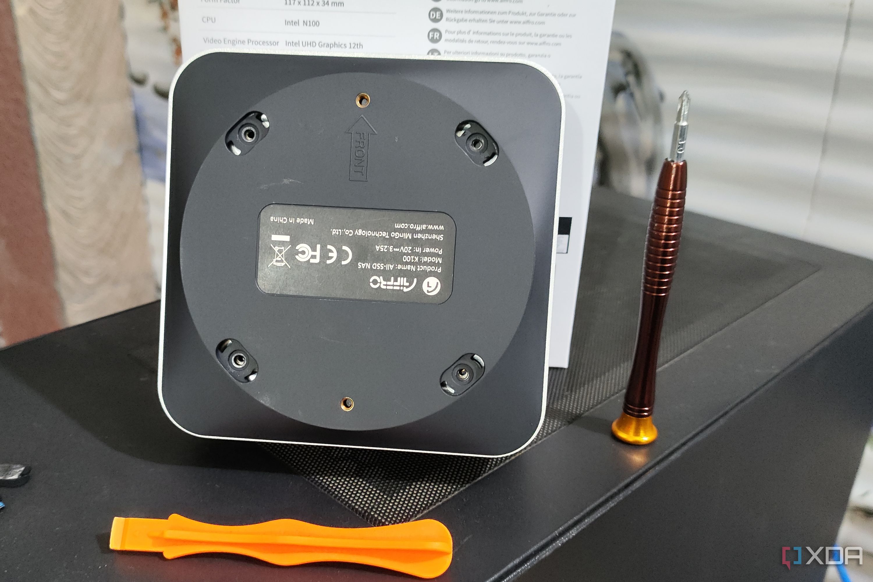 The procedure to remove the backplate of the Aiffro K100 NAS