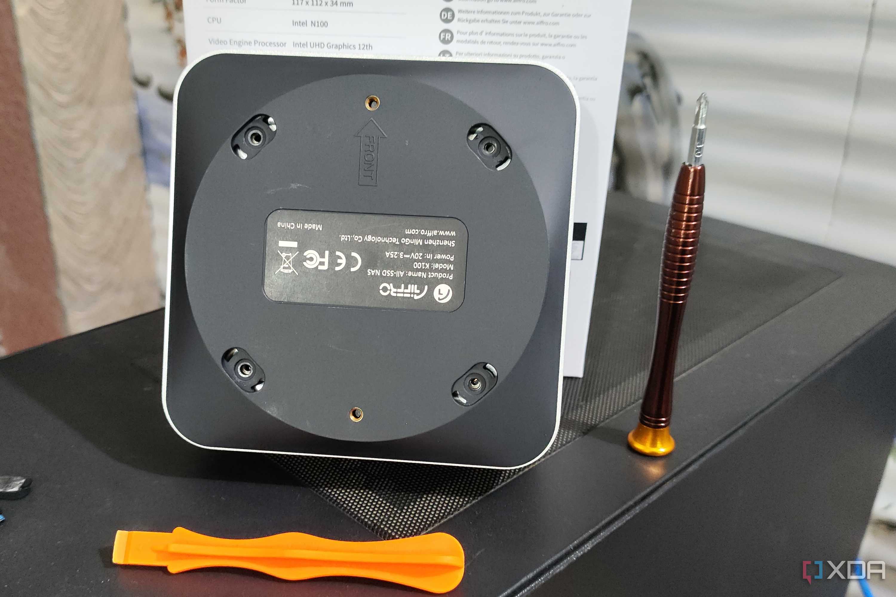 The procedure to remove the backplate of the Aiffro K100 NAS