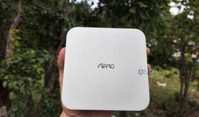 A person holding the Aiffro K100 NAS