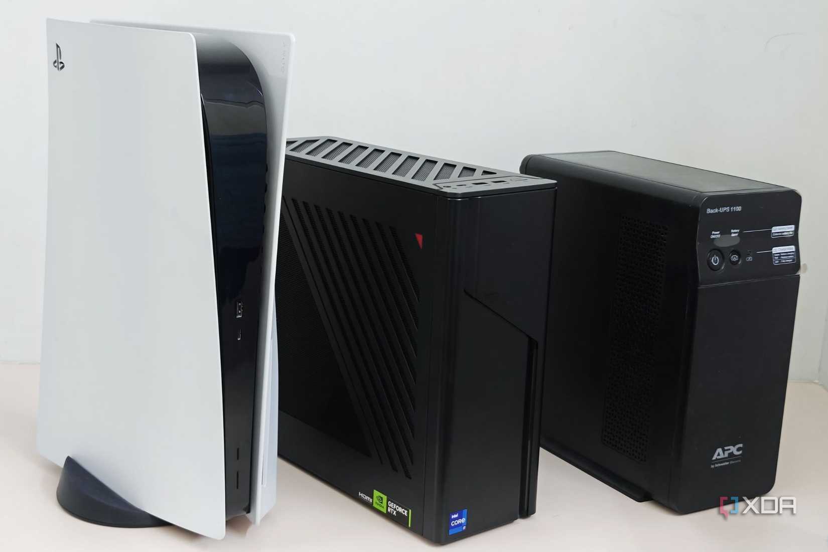 An image showing the size comparison of the G22CH with PS5 and a UPS.