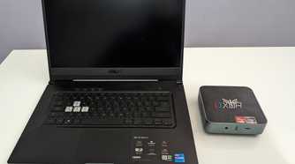 asus laptop next to an amd based mini PC