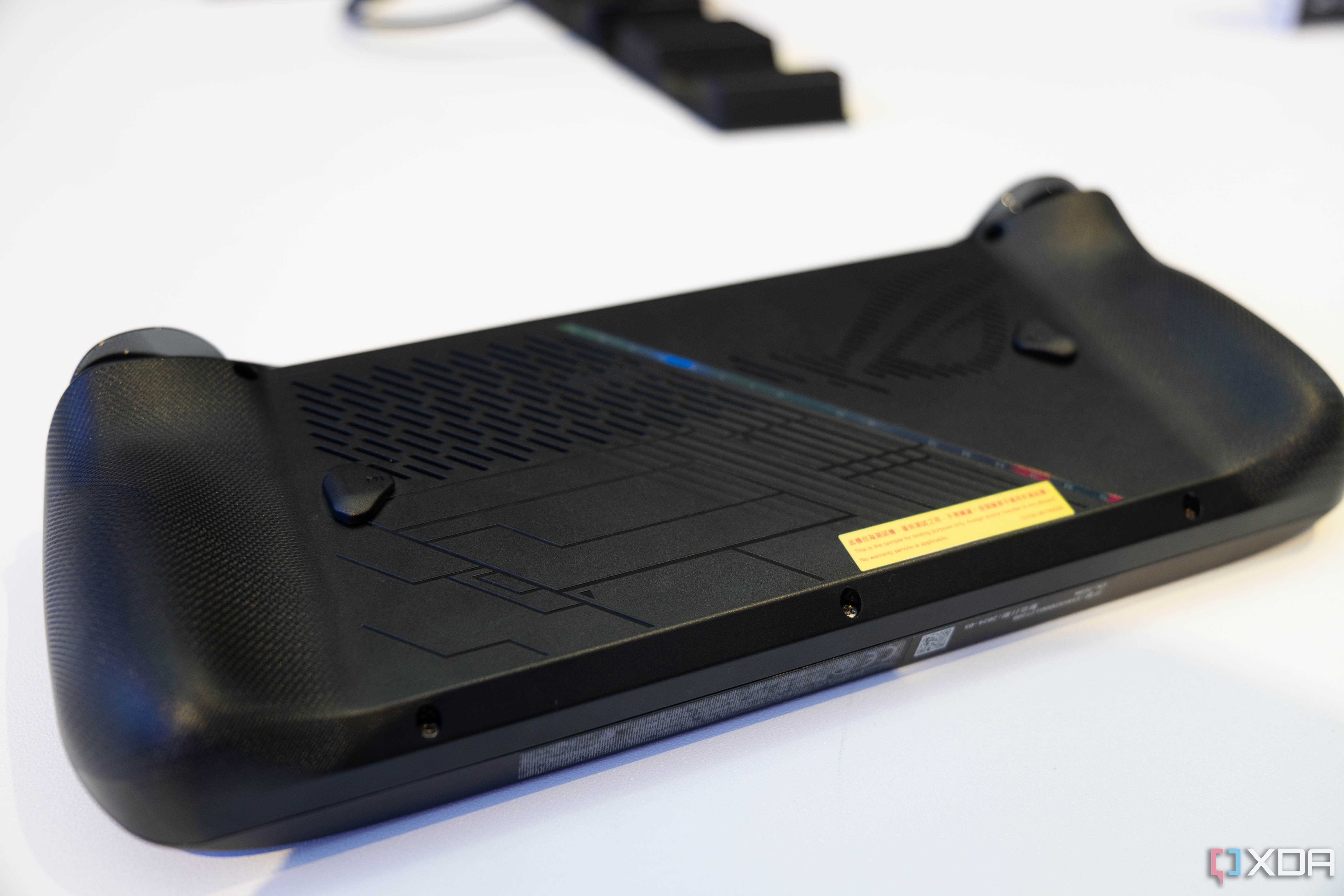 Asus ROG Ally X lying face down on a table