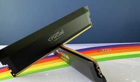 An image of crucial ddr5-6000 ram kit in an x shape on a desk.