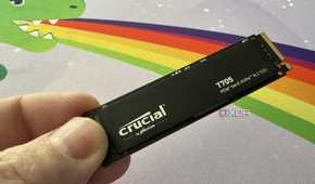 crucial t705 ssd held up in three fingers