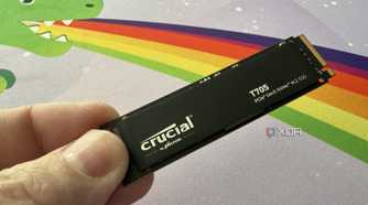 crucial t705 ssd held up in three fingers