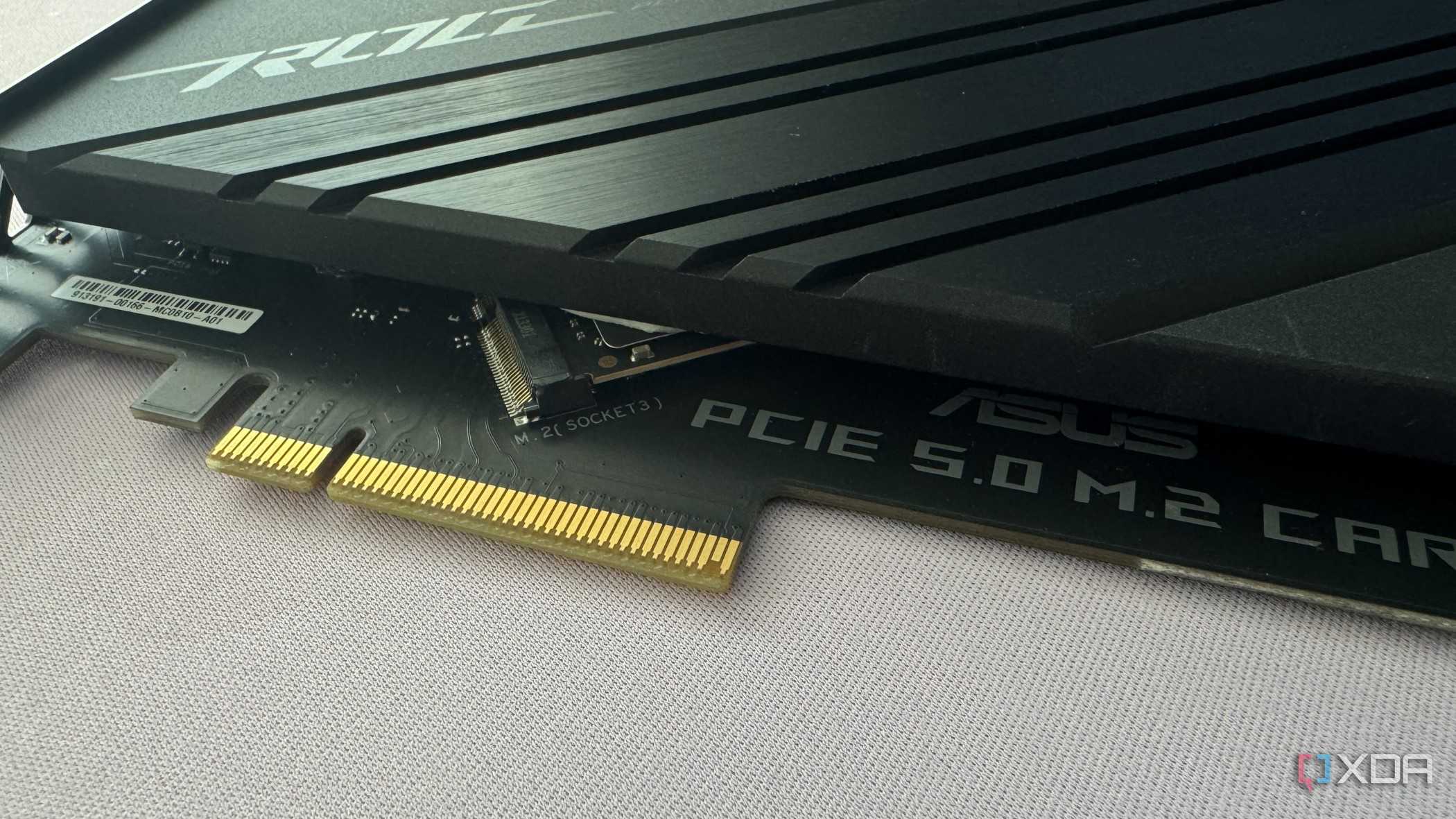 crucial t705 ssd mounted on a pcie adapter card with heatsink attached