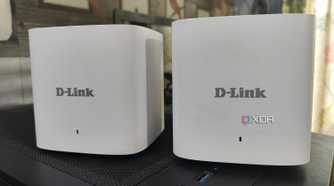 Two D-Link M15/2 Eagle Pro AI Mesh routers placed side-by-side