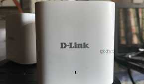Two D-Link M15/2 Eagle Pro AI Mesh routers placed side-by-side