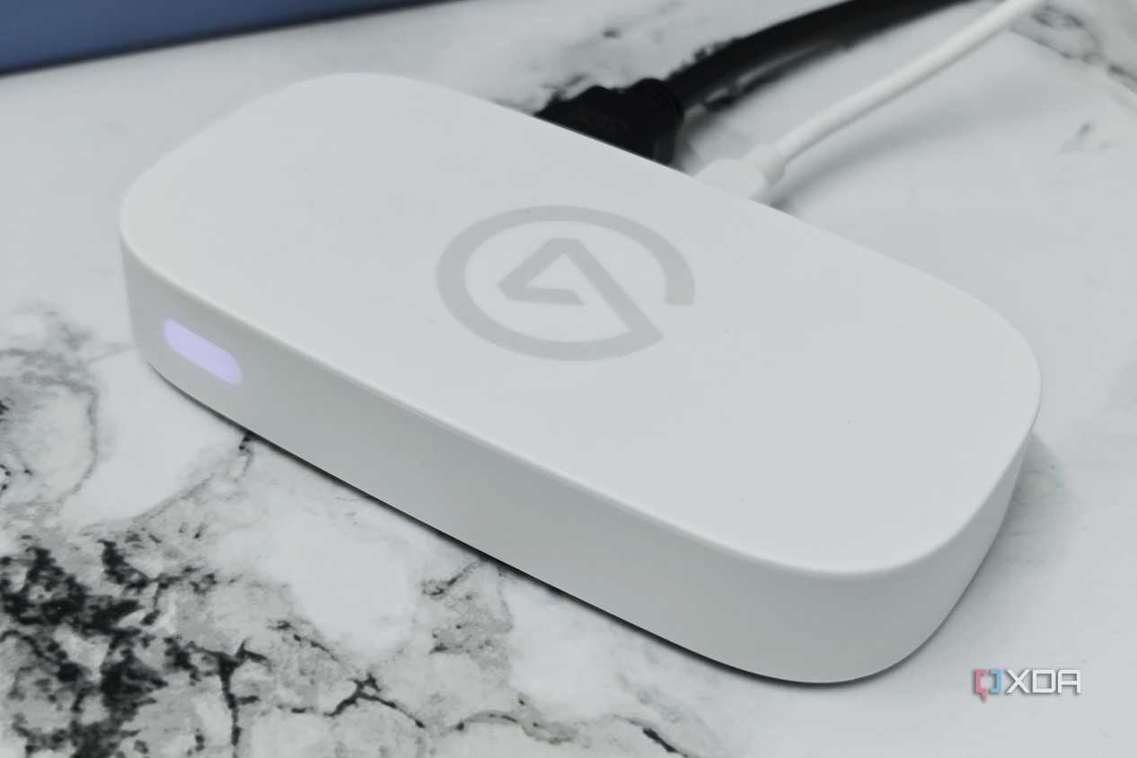 An image showing an Elgato Game Capture Neo in white color.