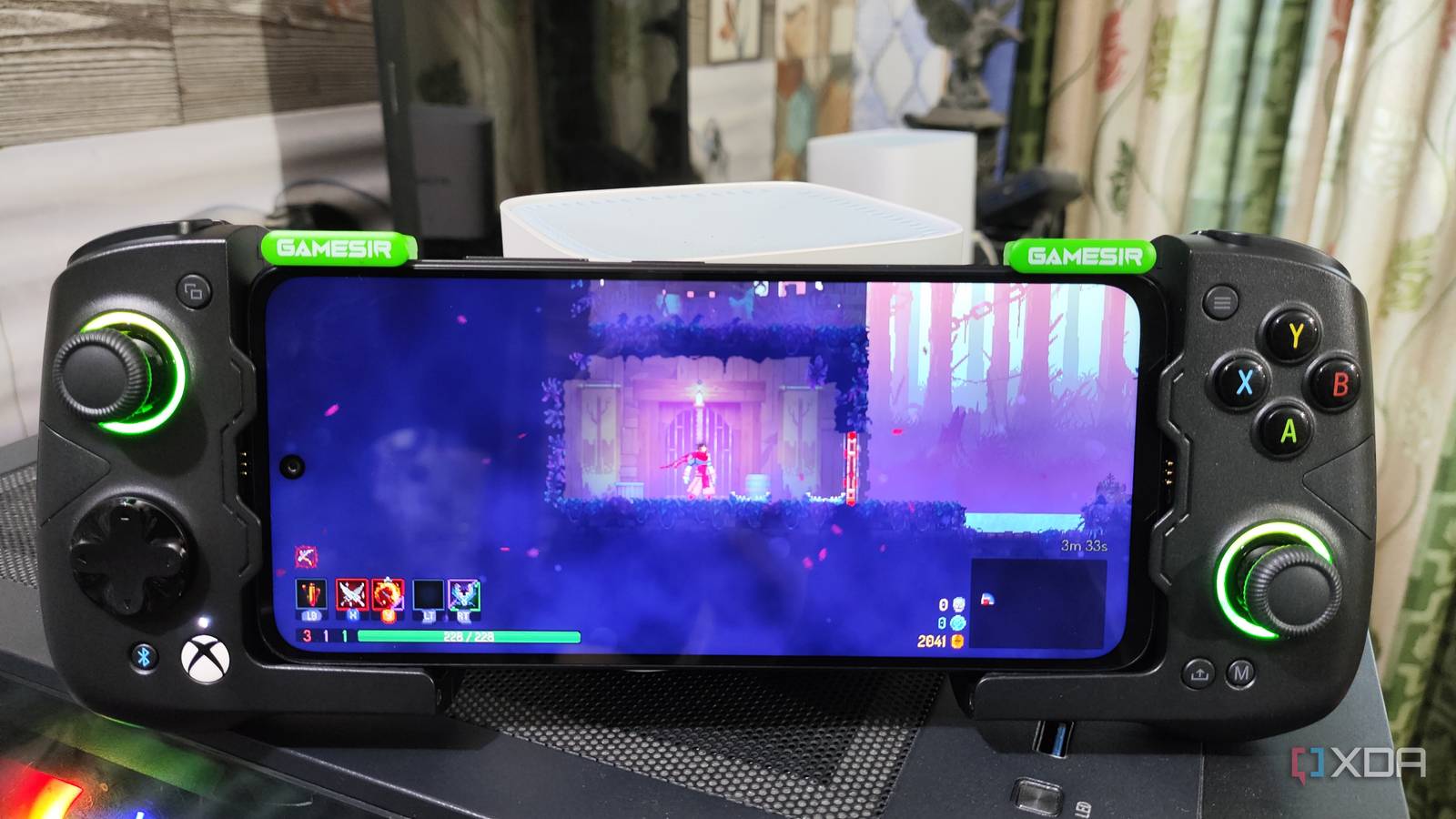 Dead Cells (Android) running on a Poco M6 Pro, with the phone connected to a GameSir X4 Aileron controller