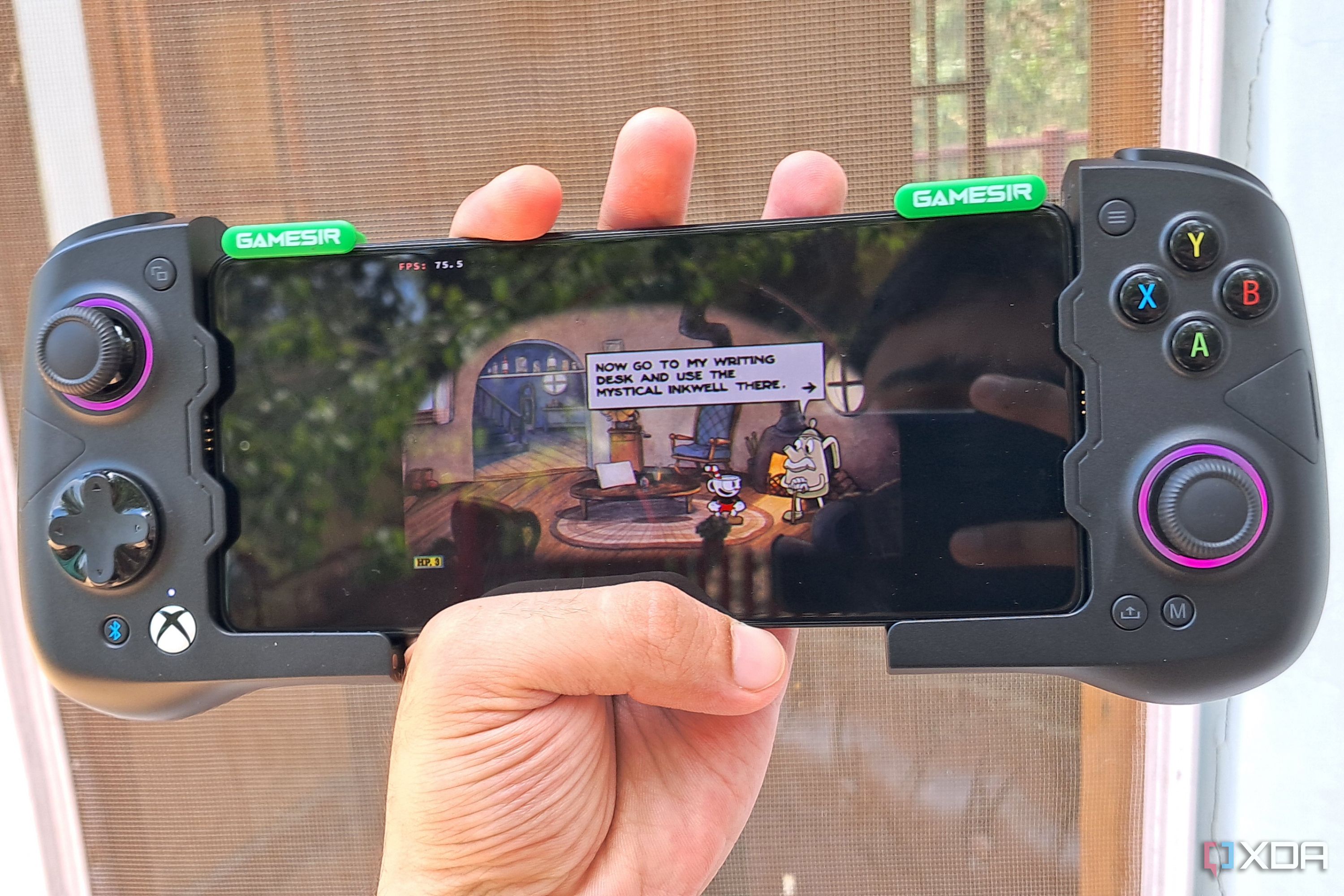 Cuphead running on a Poco F5 via Winlator, with the phone connected to a GameSir X4 Aileron controller
