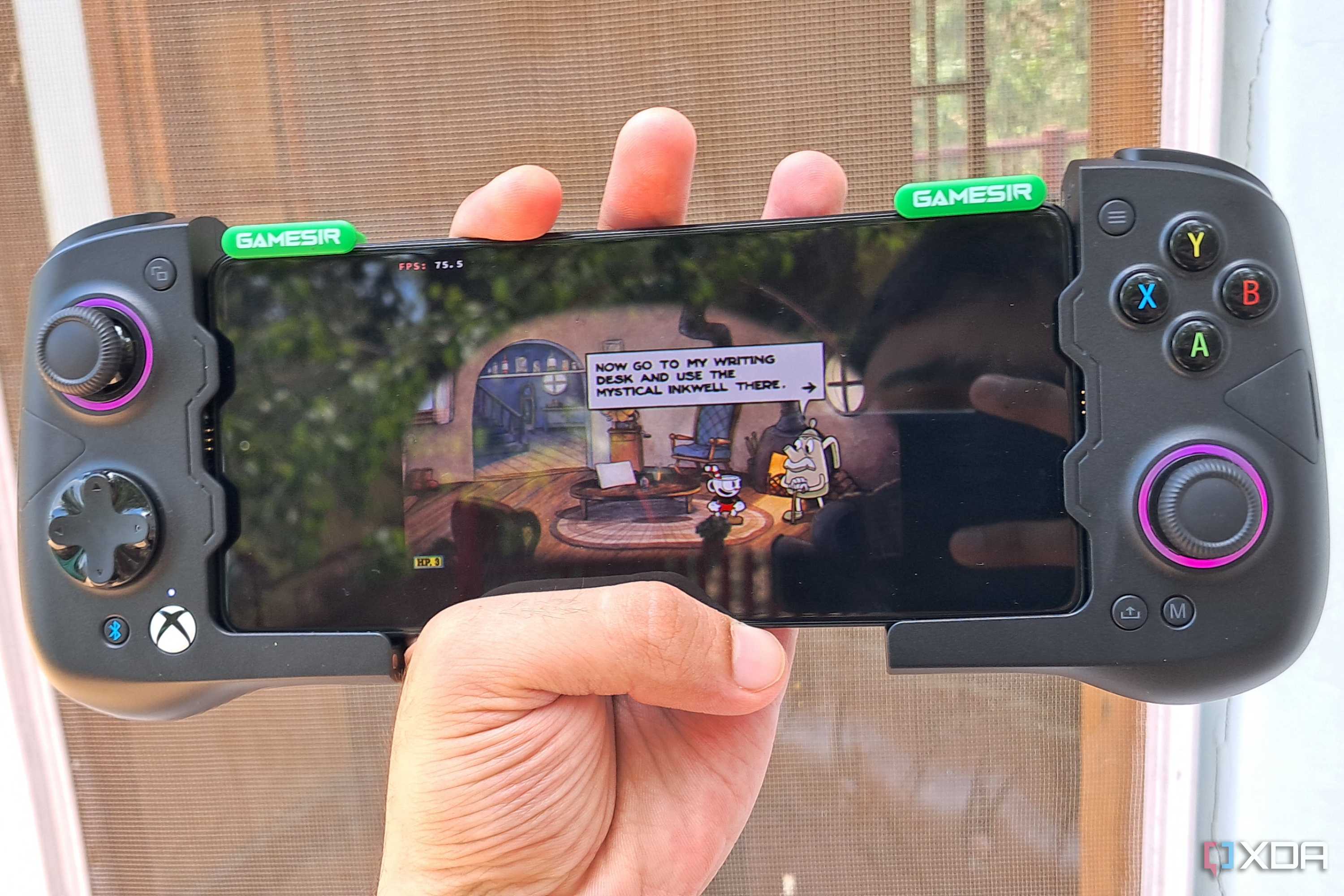 Cuphead running on a Poco F5 via Winlator, with the phone connected to a GameSir X4 Aileron controller