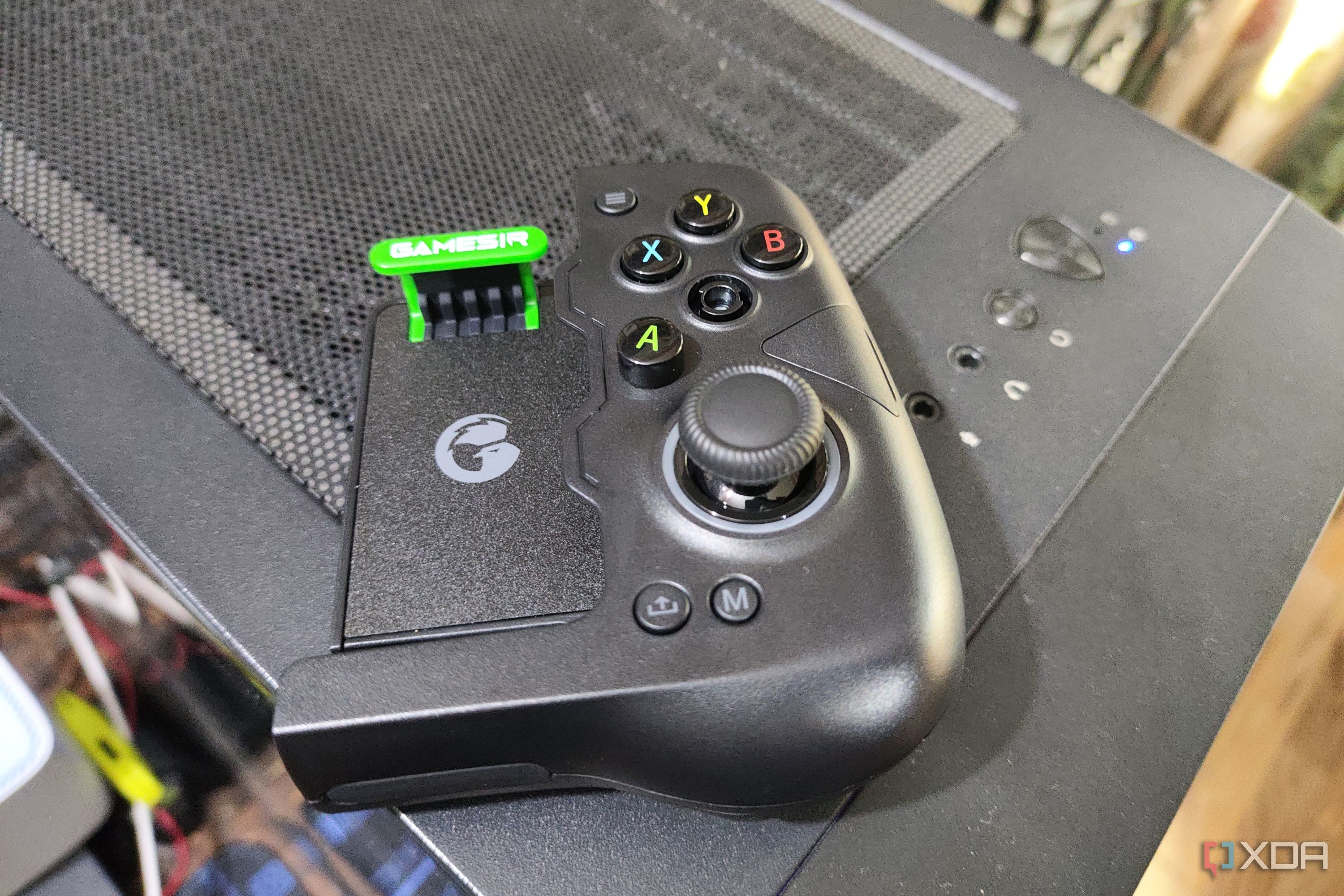 The GameSir X4 Aileron controller with one of the buttons removed