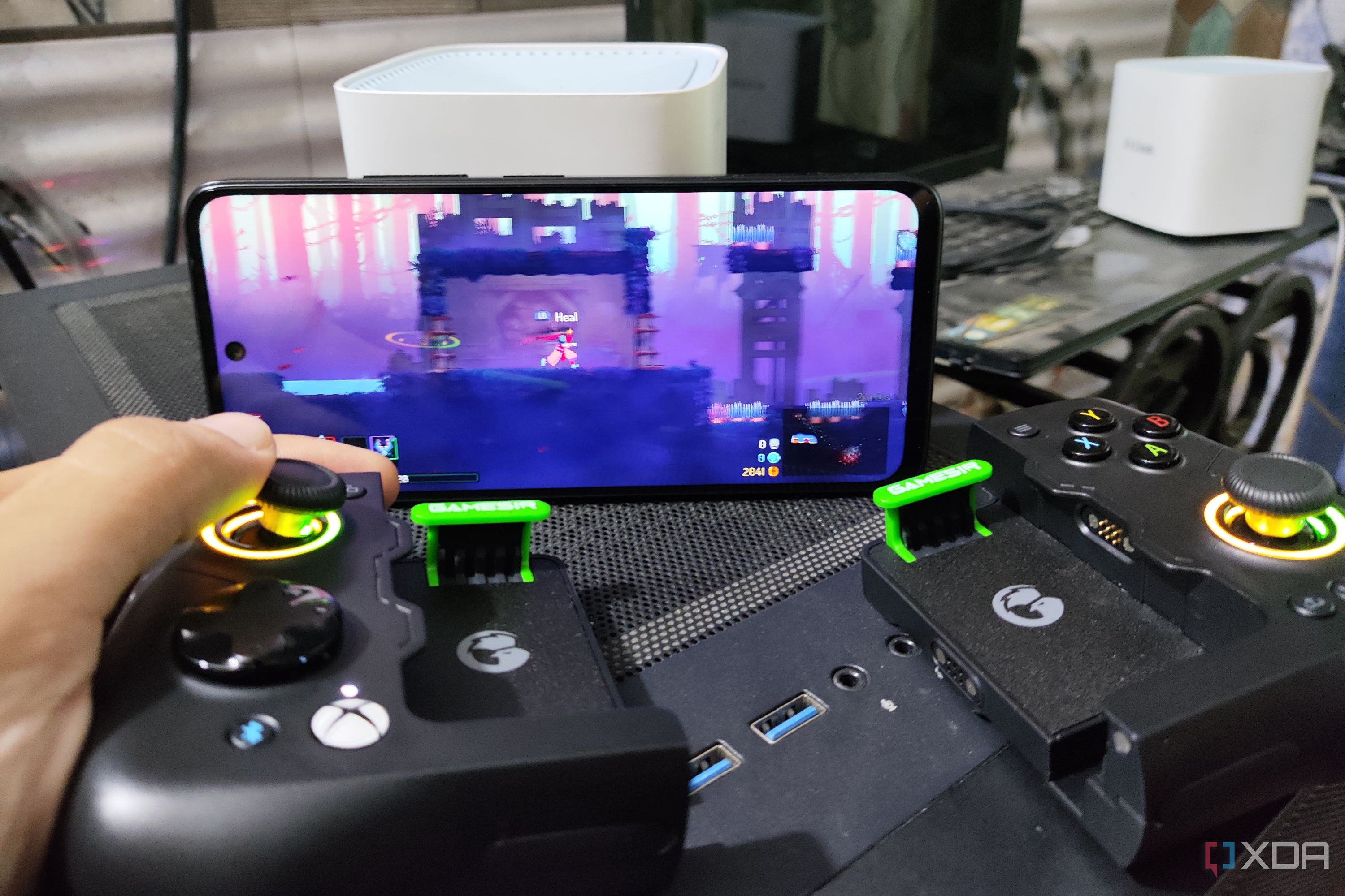 Dead Cells (Android) running on a Poco M6 Pro, with the phone paired to a GameSir X4 Aileron controller