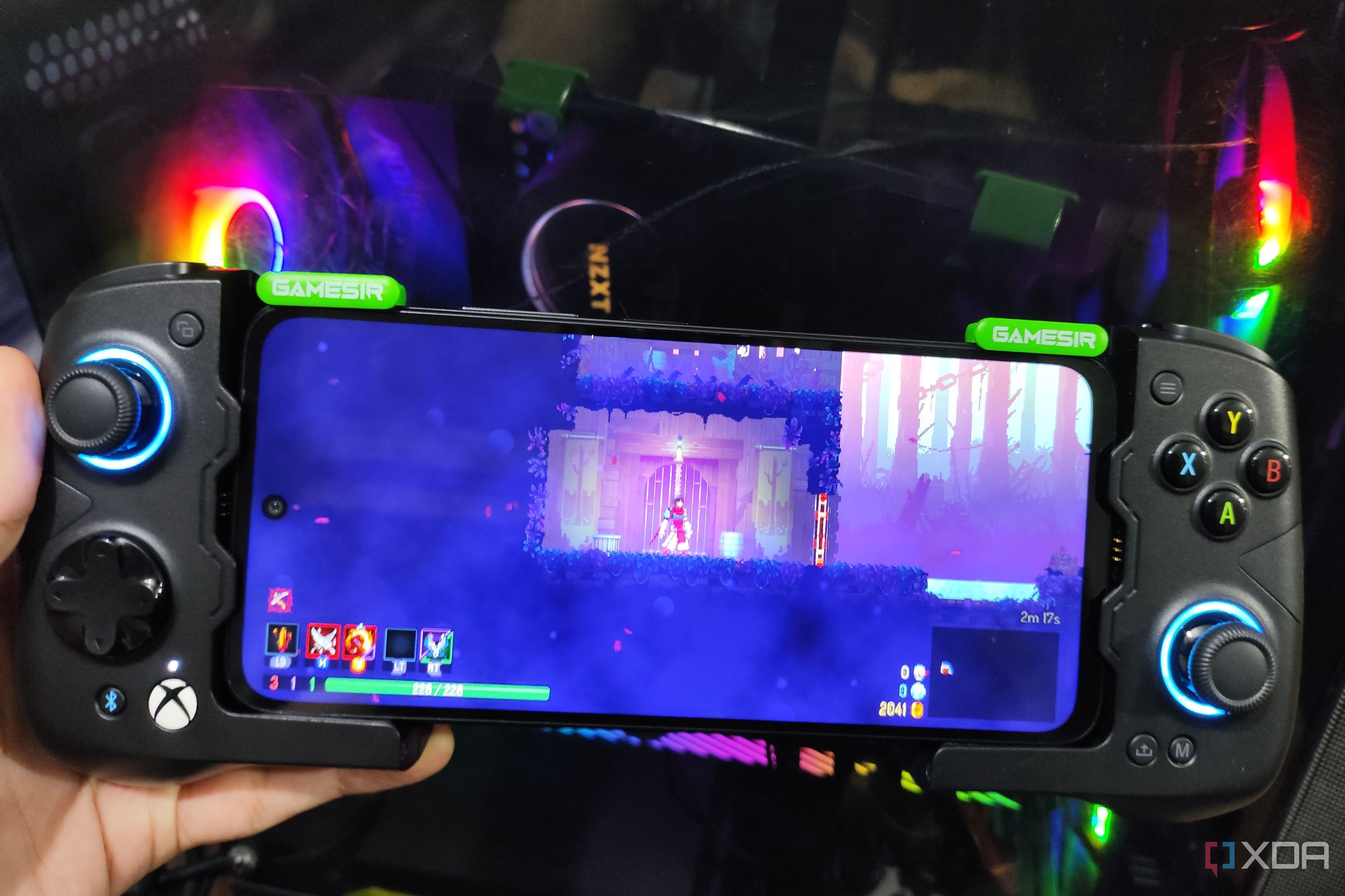 Dead Cells (Android) running on a Poco M6 Pro, with the phone connected to a GameSir X4 Aileron controller