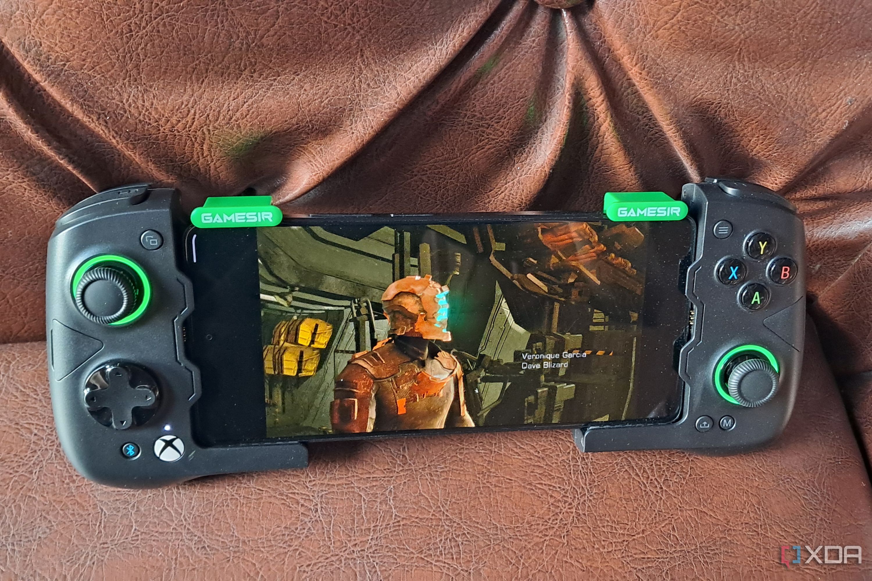 Dead Space (2008) running on a Poco F5 via Winlator, with the phone connected to a GameSir X4 Aileron controller