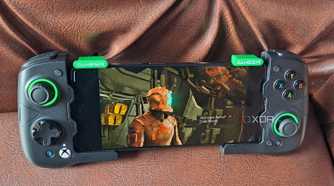 Dead Space (2008) running on a Poco F5 via Winlator, with the phone connected to a GameSir X4 Aileron controller