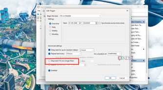 A screenshot showing the highlighted checkbox in Edit trigger in Windows Task Scheduler.