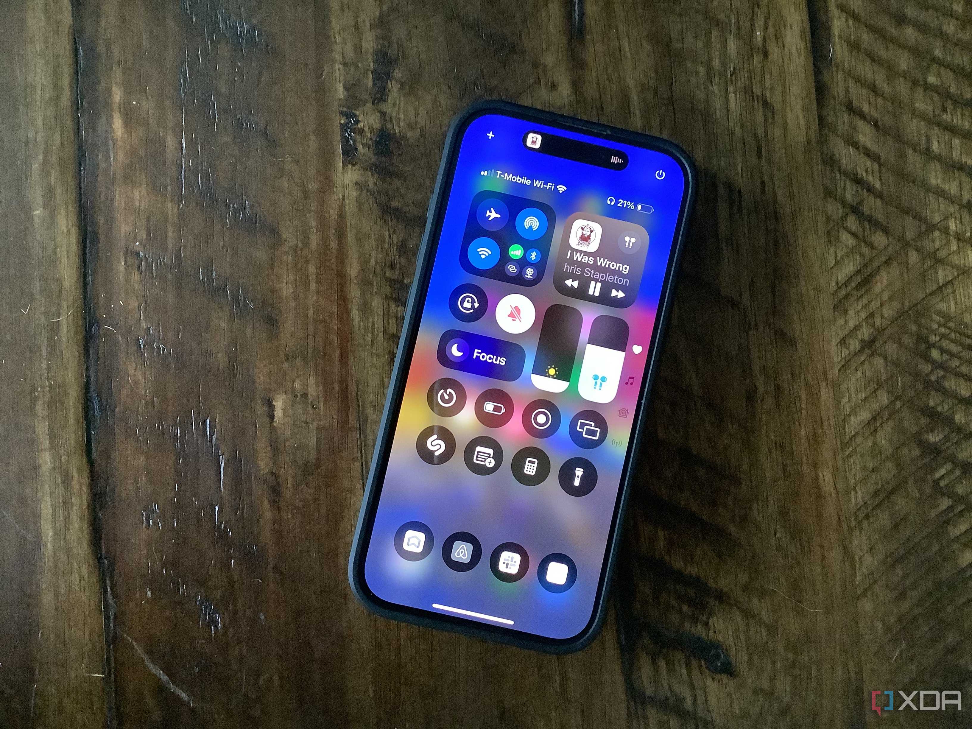 Feature photo of iPhone 15 Pro and iOS18 congrol center