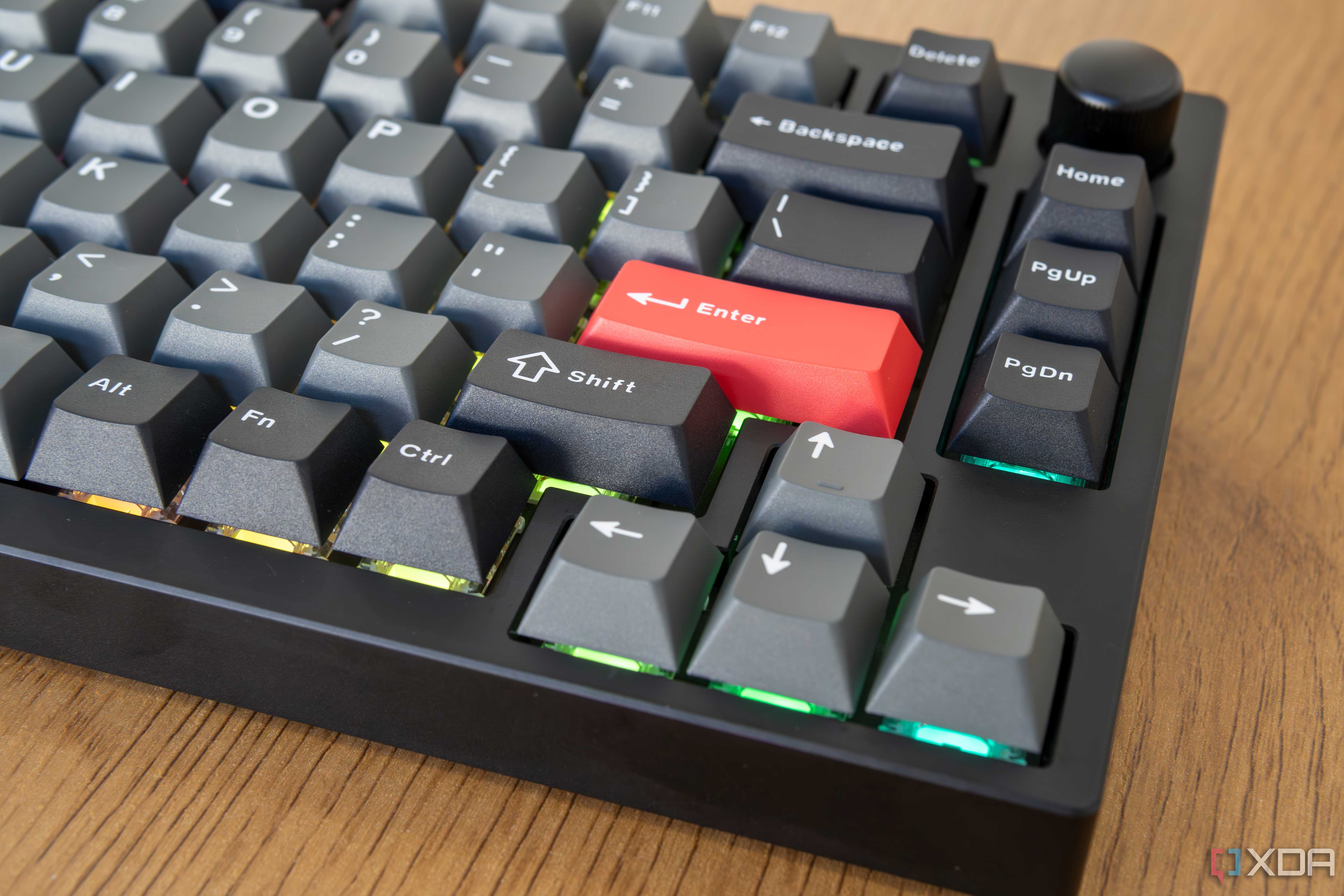 Close-up of the arrow keys on the Lemokey P1 Pro with RGB lighting under the keys